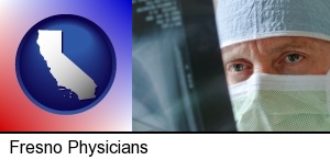 Fresno, California - a physician viewing x-ray results