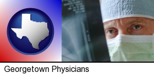 Georgetown, Texas - a physician viewing x-ray results