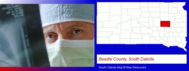 a physician viewing x-ray results; Beadle County, South Dakota highlighted in red on a map