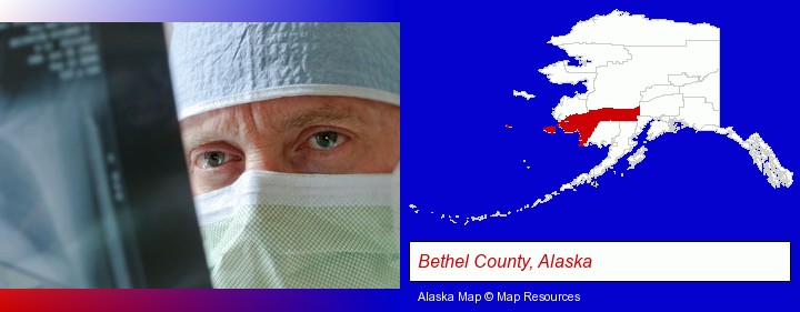 a physician viewing x-ray results; Bethel County, Alaska highlighted in red on a map