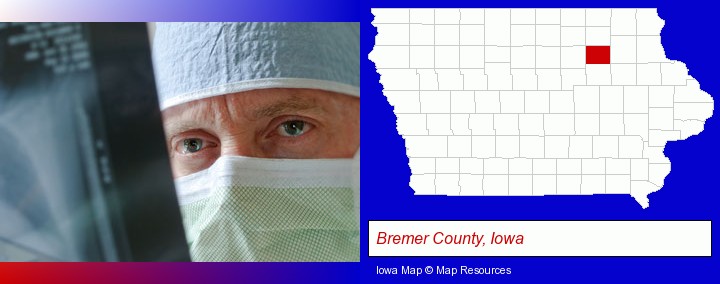 a physician viewing x-ray results; Bremer County, Iowa highlighted in red on a map