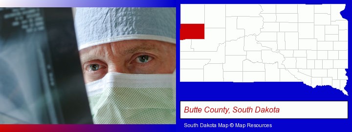 a physician viewing x-ray results; Butte County, South Dakota highlighted in red on a map