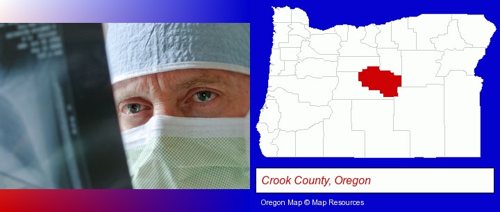 a physician viewing x-ray results; Crook County, Oregon highlighted in red on a map