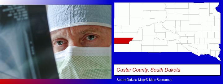 a physician viewing x-ray results; Custer County, South Dakota highlighted in red on a map