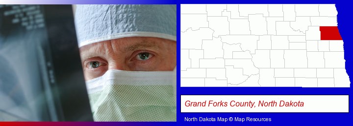 a physician viewing x-ray results; Grand Forks County, North Dakota highlighted in red on a map