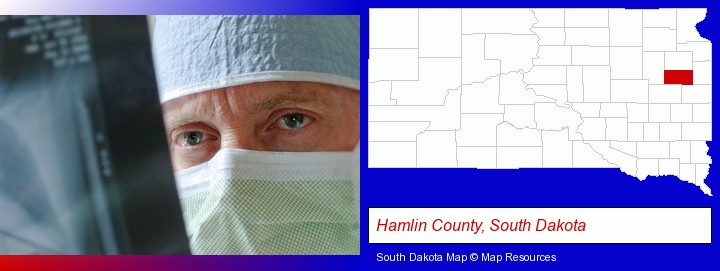 a physician viewing x-ray results; Hamlin County, South Dakota highlighted in red on a map
