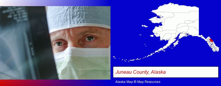 a physician viewing x-ray results; Juneau County, Alaska highlighted in red on a map