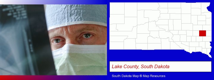 a physician viewing x-ray results; Lake County, South Dakota highlighted in red on a map