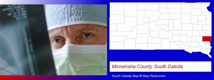 a physician viewing x-ray results; Minnehaha County, South Dakota highlighted in red on a map