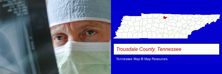 a physician viewing x-ray results; Trousdale County, Tennessee highlighted in red on a map