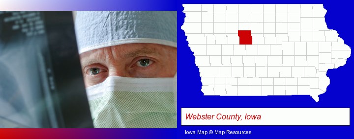 a physician viewing x-ray results; Webster County, Iowa highlighted in red on a map