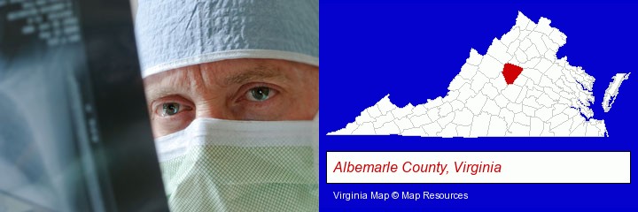 a physician viewing x-ray results; Albemarle County, Virginia highlighted in red on a map