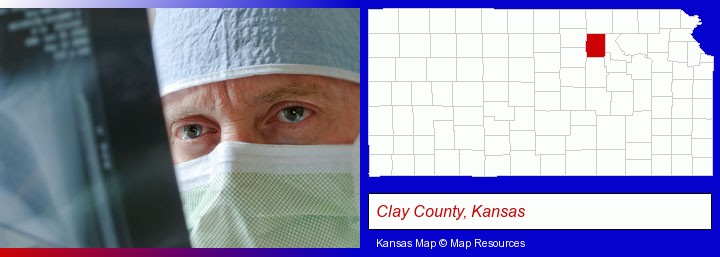 a physician viewing x-ray results; Clay County, Kansas highlighted in red on a map